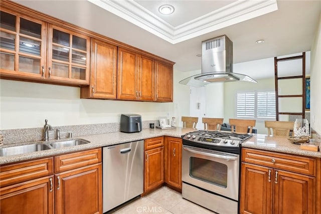 kitchen featuring sink, light tile patterned flooring, appliances with stainless steel finishes, ornamental molding, and island range hood