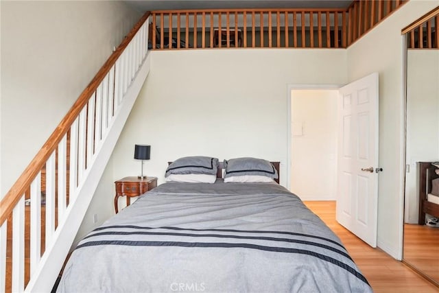 bedroom with light hardwood / wood-style flooring