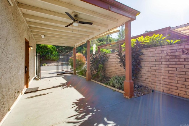 view of patio featuring ceiling fan