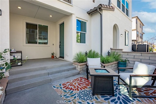 view of patio with an outdoor fire pit