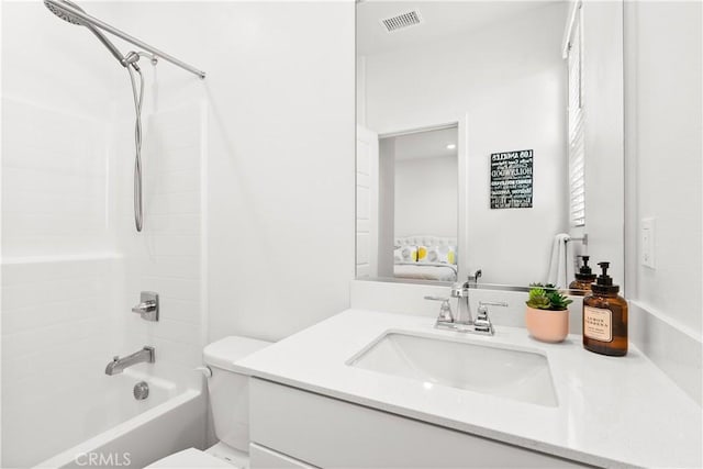 full bathroom with toilet, vanity, and bathing tub / shower combination