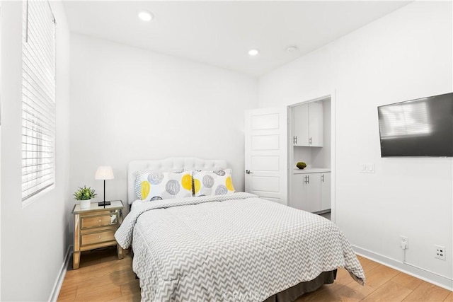 bedroom featuring light hardwood / wood-style floors