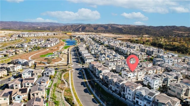 drone / aerial view featuring a mountain view