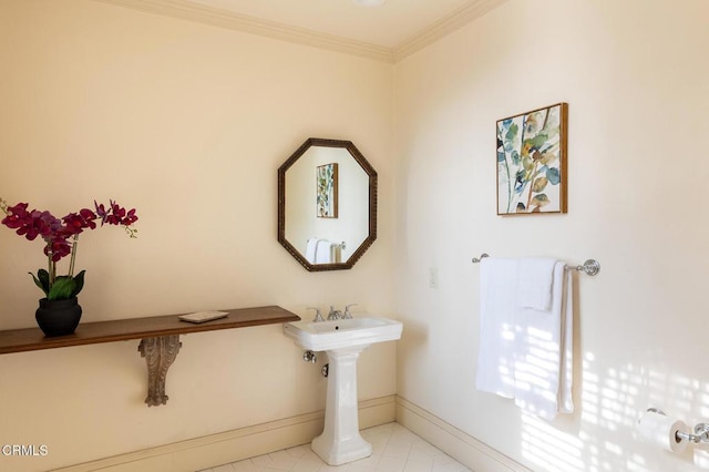 bathroom with tile patterned floors and crown molding