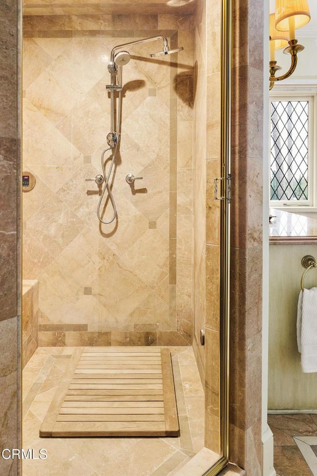 bathroom with an enclosed shower