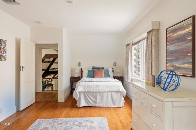 bedroom featuring light hardwood / wood-style floors