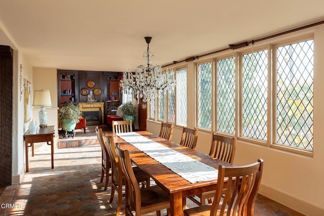 dining space with a chandelier