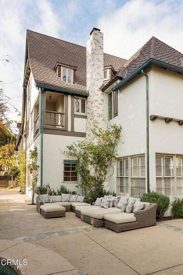 rear view of house featuring a patio area