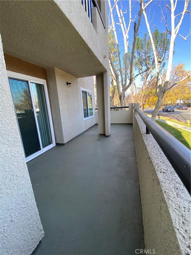 view of patio / terrace with a balcony