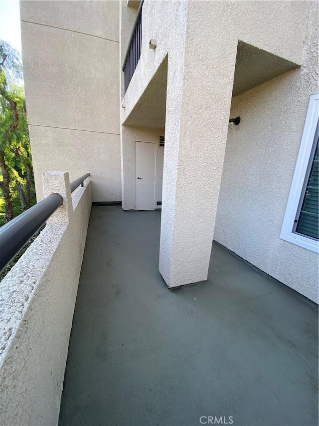 view of patio / terrace featuring a balcony