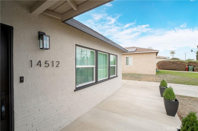 view of home's exterior featuring a patio