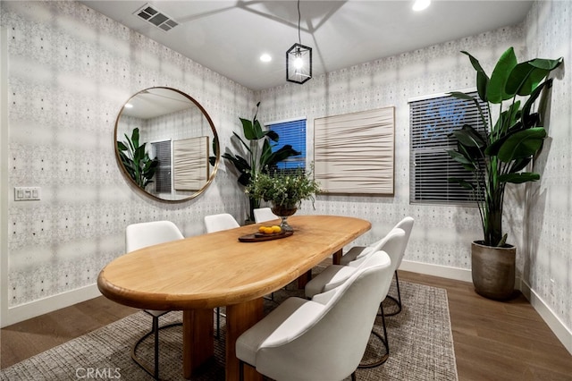 dining room featuring hardwood / wood-style flooring