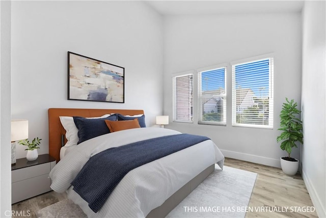 bedroom featuring light hardwood / wood-style floors