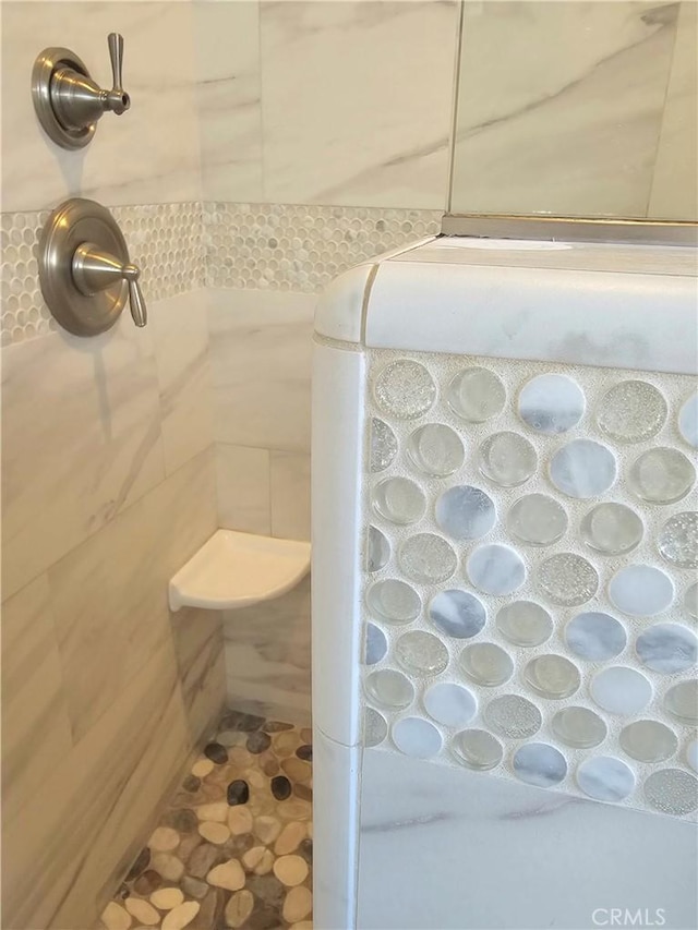 bathroom with walk in shower