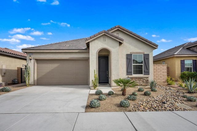 single story home with a garage