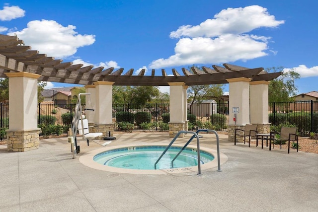 view of swimming pool with a pergola, a patio area, and a community hot tub