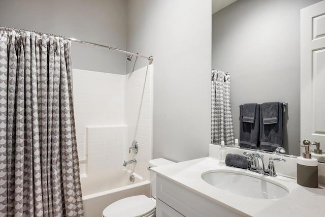 full bathroom featuring toilet, shower / tub combo, and vanity