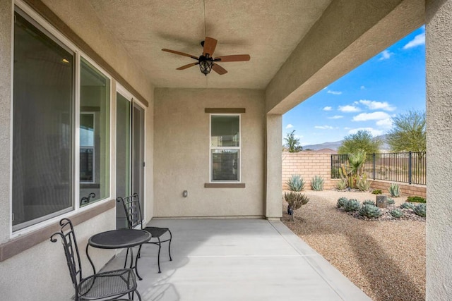 view of patio with ceiling fan