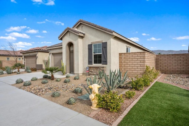 view of front of home featuring a garage