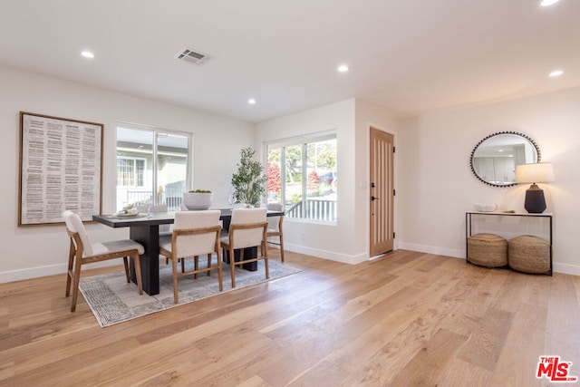 dining room with light wood-type flooring