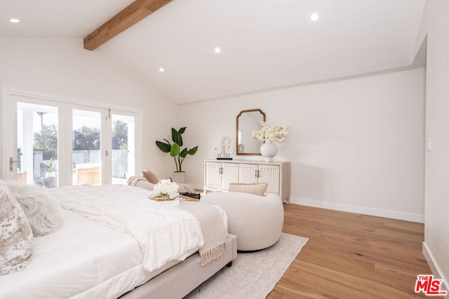 bedroom featuring lofted ceiling with beams, access to exterior, and hardwood / wood-style floors