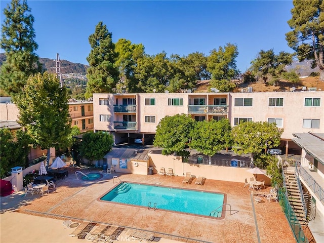 view of pool with a patio