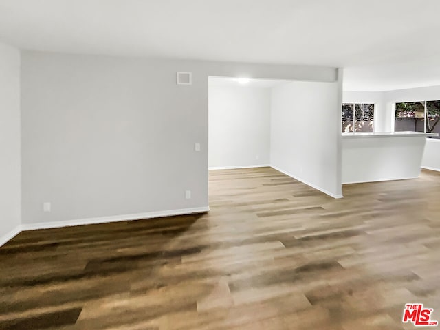 spare room with hardwood / wood-style flooring