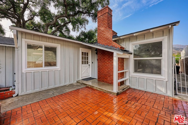 back of property featuring a patio