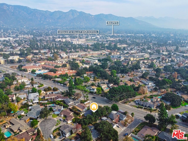 drone / aerial view featuring a mountain view