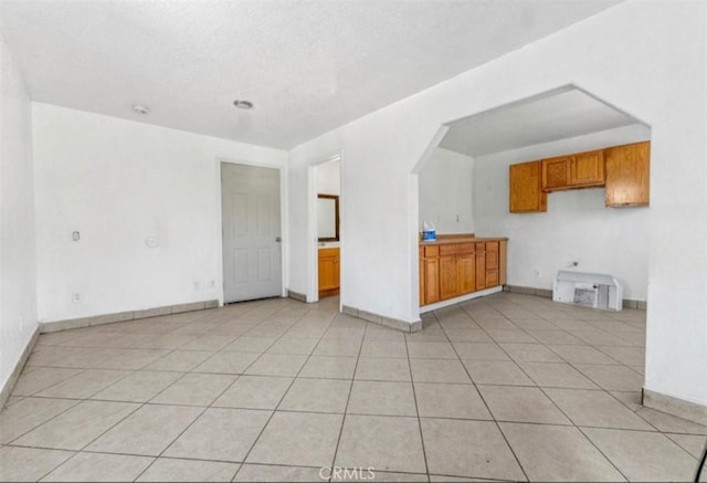 interior space with light tile patterned floors