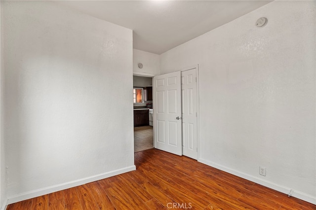 spare room featuring hardwood / wood-style floors