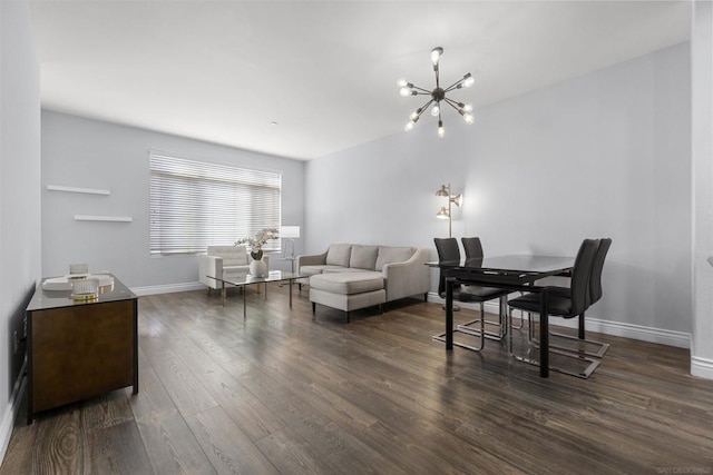 dining room with a chandelier and dark hardwood / wood-style flooring