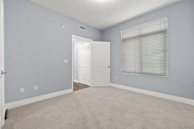 unfurnished bedroom featuring carpet floors