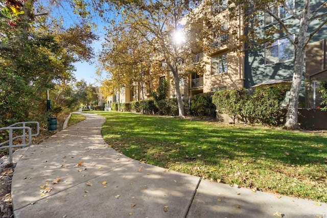 view of home's community featuring a yard