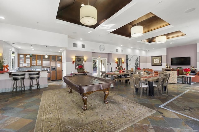 playroom with a wealth of natural light, billiards, and a raised ceiling