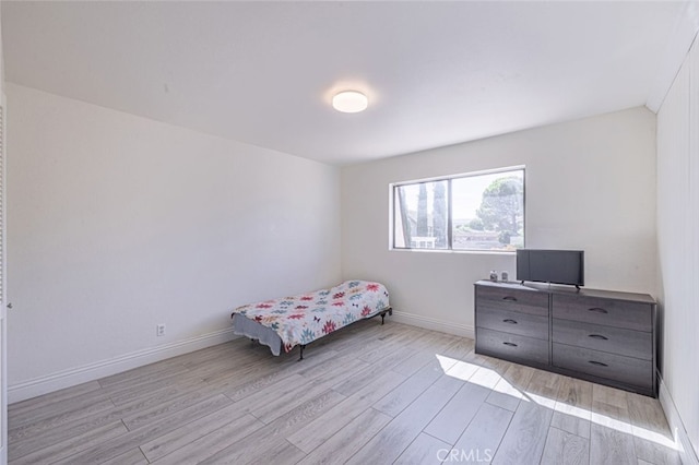 unfurnished bedroom featuring light hardwood / wood-style floors