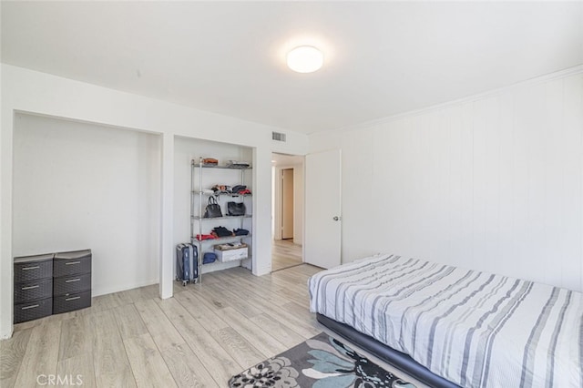 bedroom featuring light hardwood / wood-style flooring