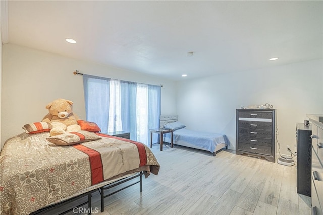 bedroom featuring light wood-type flooring