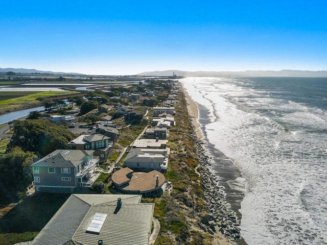 bird's eye view with a view of the beach and a water view