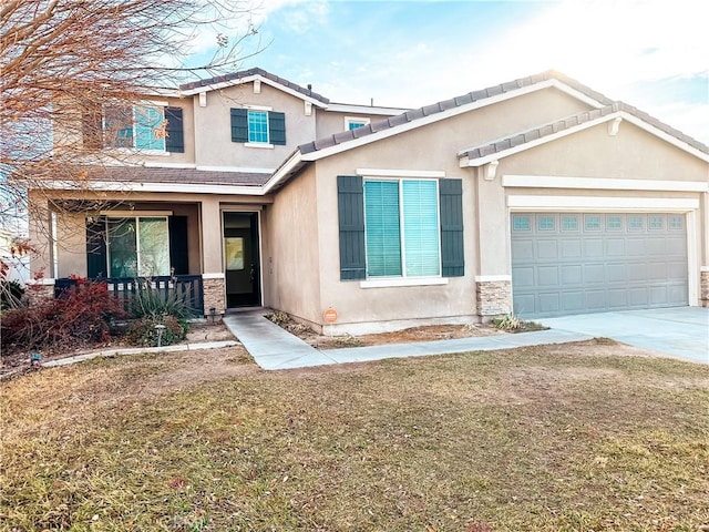 craftsman-style home with a front lawn, a porch, and a garage