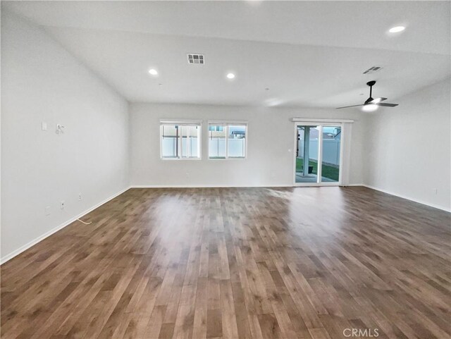 unfurnished room with dark wood-type flooring and ceiling fan