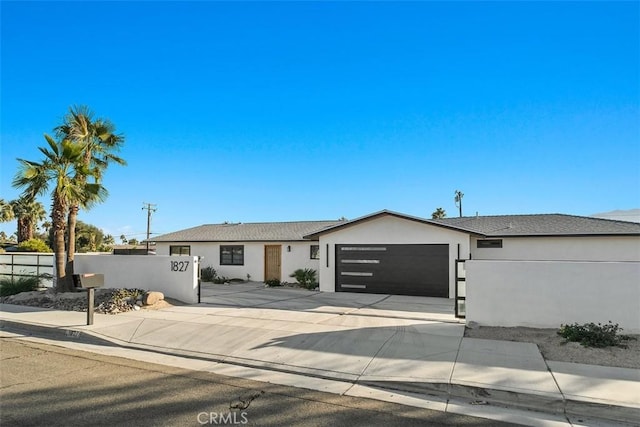 ranch-style home with a garage