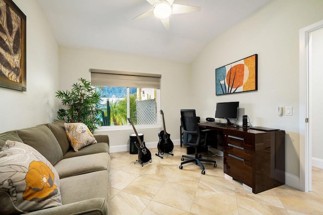 office with ceiling fan and vaulted ceiling