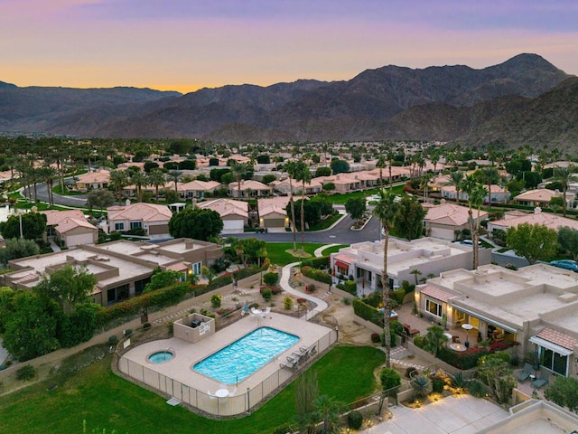 aerial view at dusk with a mountain view