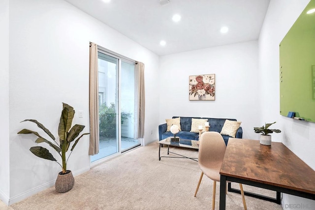 living room with light colored carpet