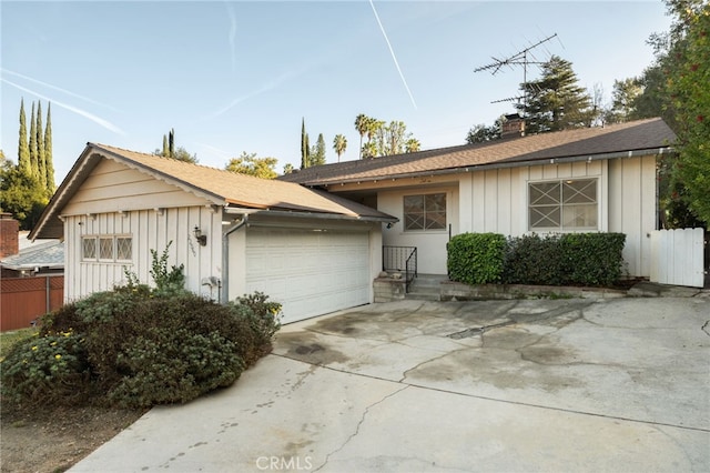 ranch-style home with a garage