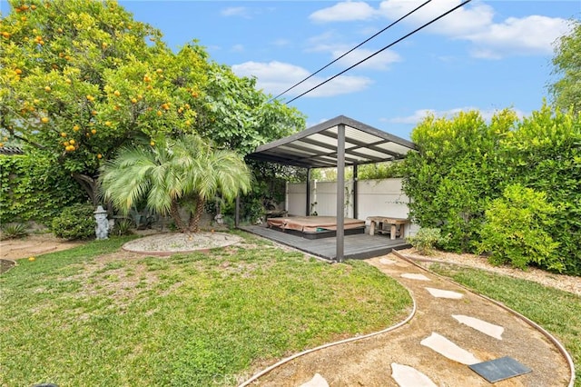 view of yard with a deck