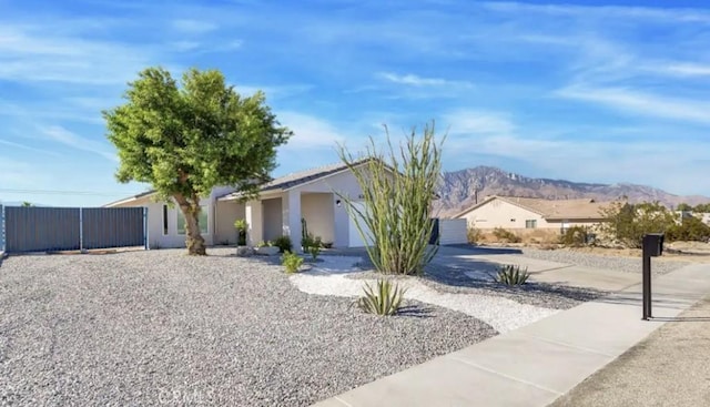 ranch-style house with a mountain view