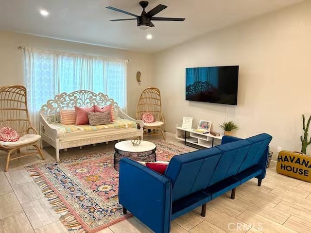 living room with ceiling fan