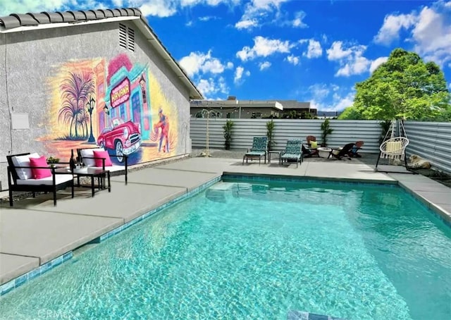 view of pool with a patio